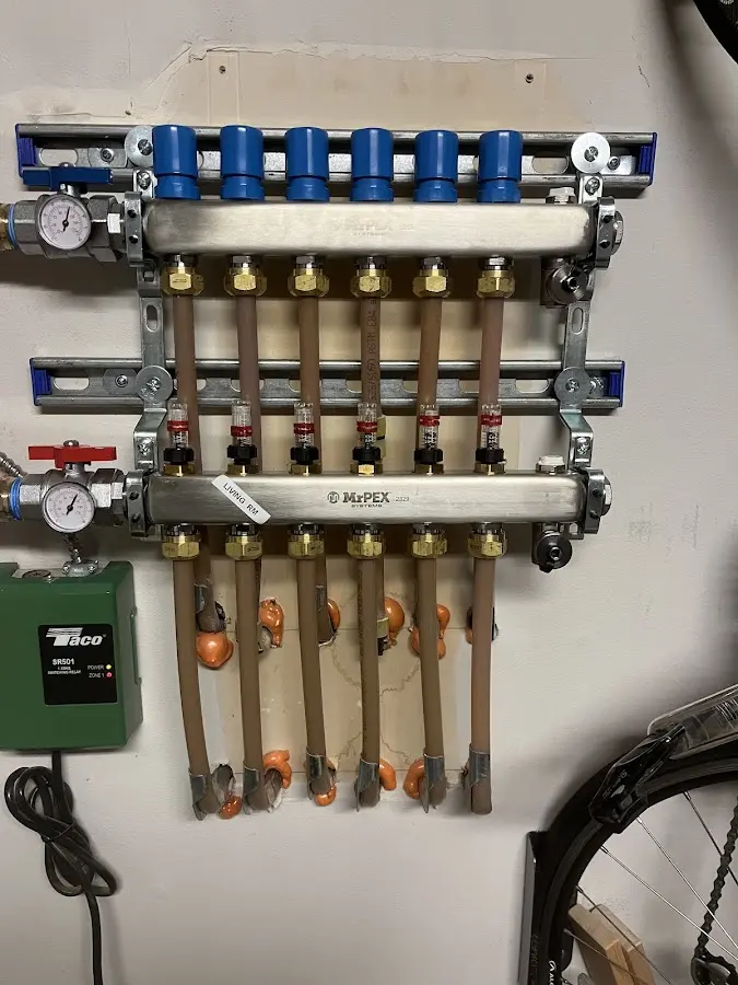 Plumber performing Water Heater Repair at a residential property in Universal City